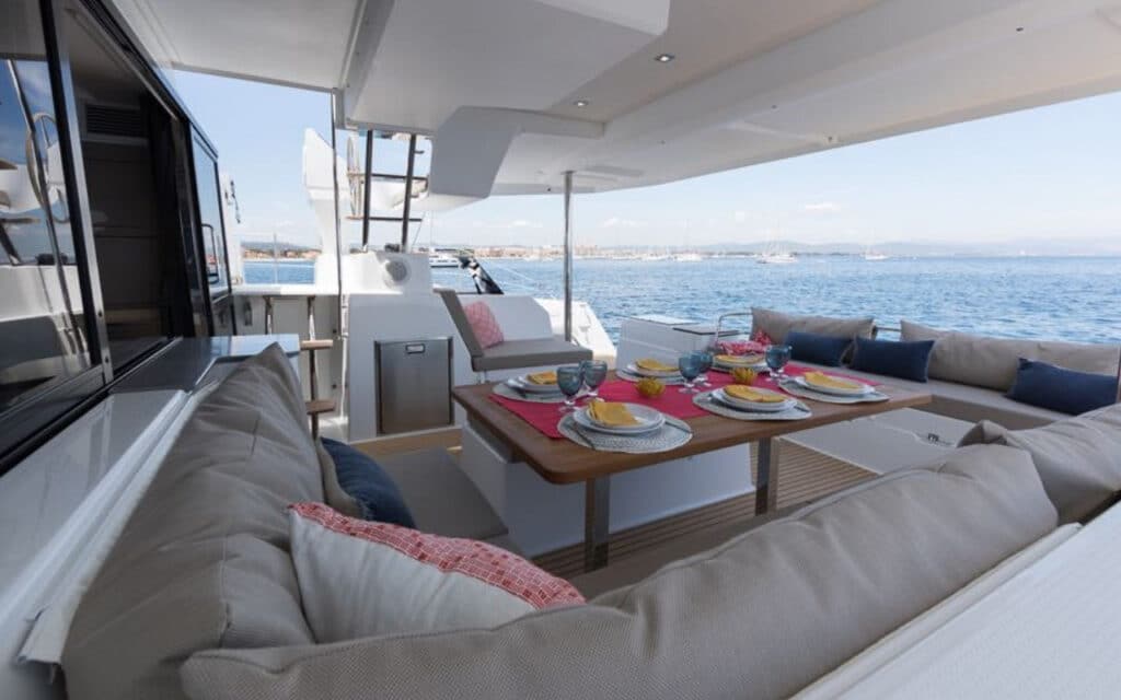 Fountaine 47 boat lounge. Boats in Paros. Charter a Boat.