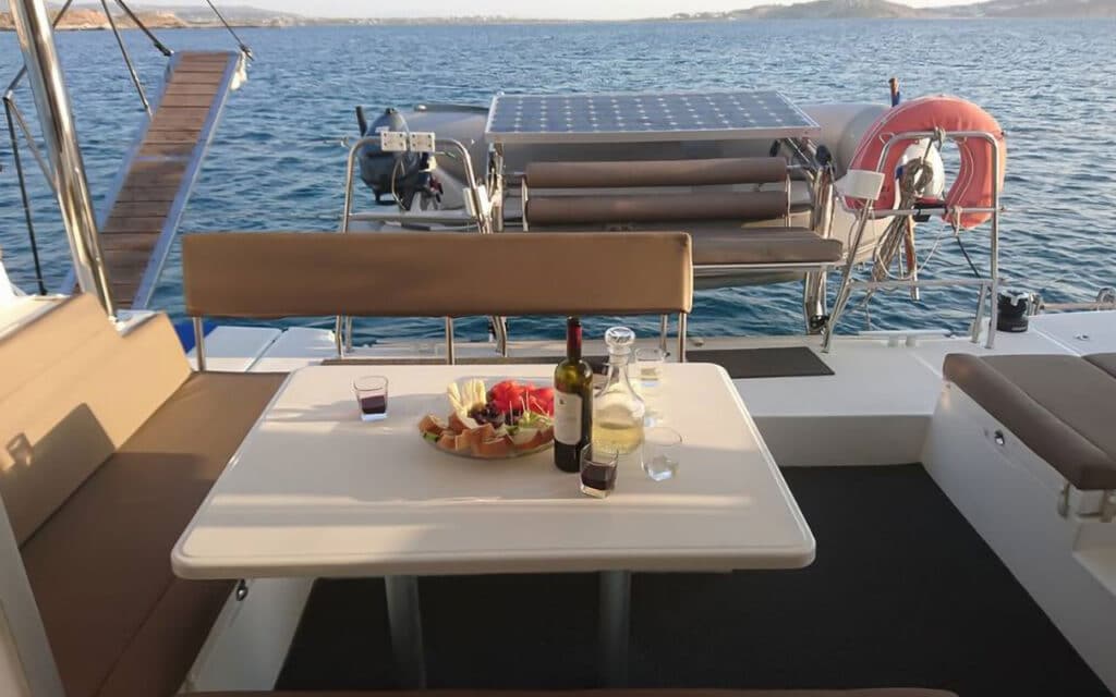 dinner on a Lagoon 400 boat. Boats in Paros. Charter a Boat.